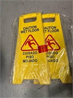 (2) Caution wet floor sign