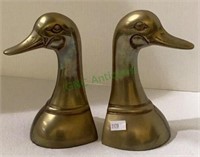 Weighted brass duck head bookends measuring 6