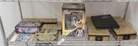 ASSORTED YUGIOH COLLECTOR ITEMS, TINS, CARDS,