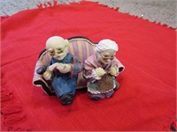 Vtg Grandma & Grandpa figurines on sofa