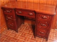 Carved pull kneehole desk