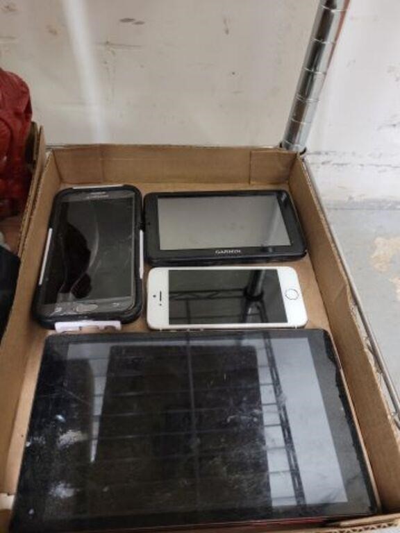 TRAY OF CELL PHONES AND TABLETS