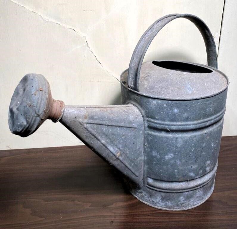 antique water can