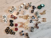 Earrings, mostly vintage, Nixon political pins