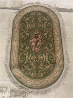 Oval Rug approx 55in x 33in