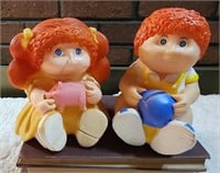 Cabbage patch boy and girl coin banks