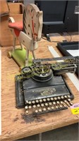 Vintage typewriter, wooden horse