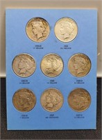 (8) Different Peace Silver Dollar: