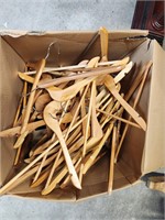 Lg box of wooden hangers