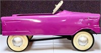 Vintage purple pedal car