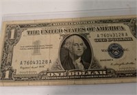 1957A $1 Silver certificate with a protective