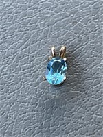 14KT Gold Pendant set with Blue Stone