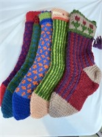 Lot of five hand knitted stockings