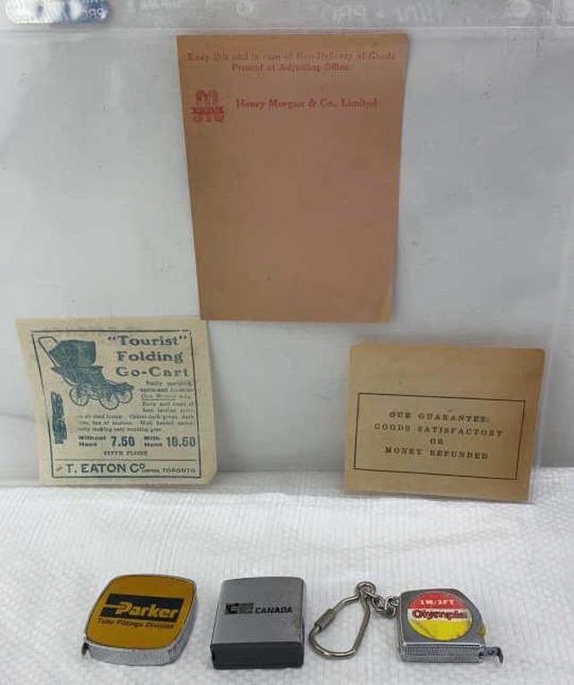 Antique pocket tape measures and Eatons receipts