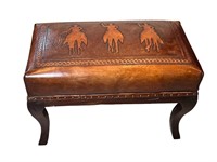 An Embossed Leather Stool 19.5"H x 26"W x 15"D