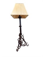 An Iron Table Lamp w/ Rawhide Shade