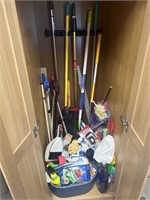 A Collection Of Cleaning Supplies, Ironing Board,