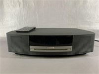 A Bose CD/ Radio Player With Remote
