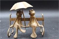 BRASS FROGS WITH UMBRELLA ON BENCH