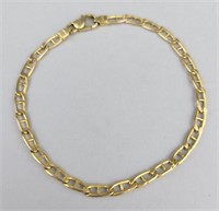 14K Gold Italian Figaro Link Bracelet.