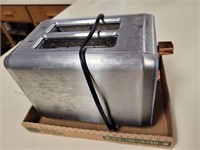 STAINLESS AND COPPER WHALL TOASTER