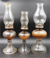 TRIO OF CLEAR GLASS OIL LAMPS W CHIMNEYS