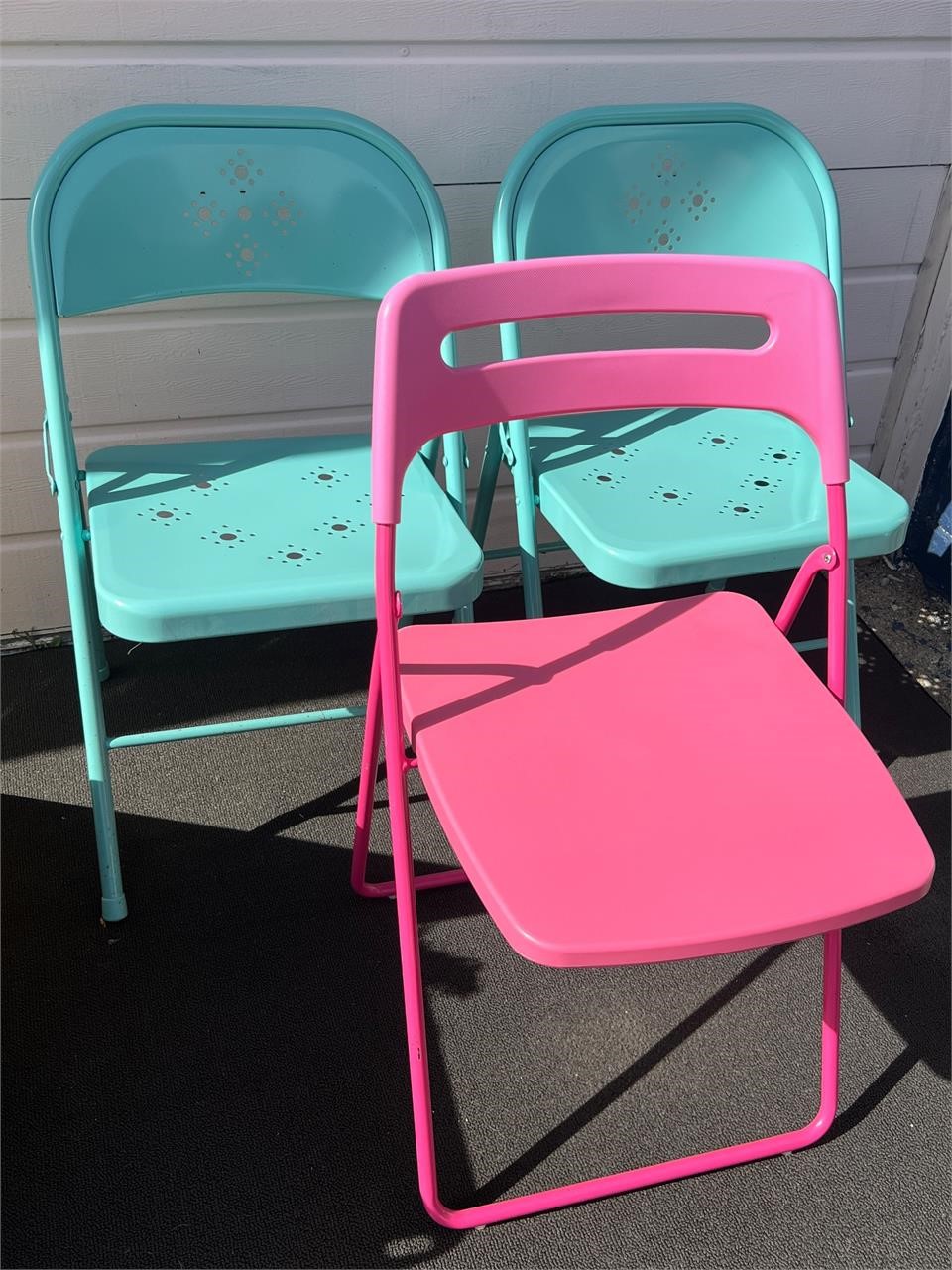 Trio of Colorful Folding Chairs