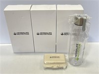 4 Herbalife Nutrition bottles and tablet cases