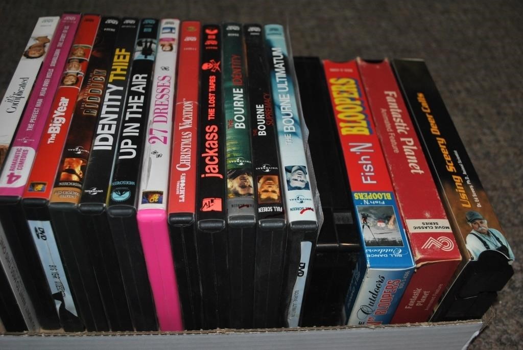 flat of dvd movies and vhs movies