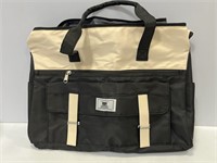 Women’s black and beige carrying fashion bag