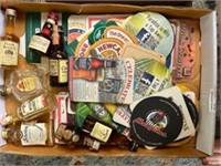 Alcohol coasters and vintage empty bottles