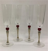 Set Of 4 Champagne Flutes With Red & Gilt Stems