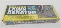 Unopened Rolling Lawn Aerator