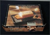 Vintage black marble cheese slicer