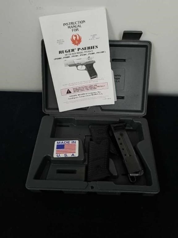 Ruger hard case, instruction manual, clip, and