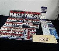 Group of license plates and vintage Maps