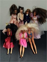 Group of Barbies and other dolls
