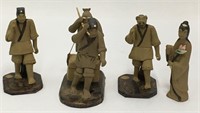 Group Of 4 Oriental Mud Figures