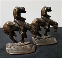 Two heavy bookends possibly brass/bronze please