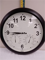 Large round clock with thermometer and humidity