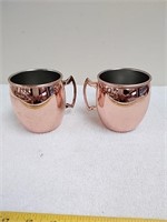 2 polished brass cups