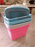 Group of plastic storage totes