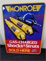 Metal Monroe gas charged shocks and struts sign