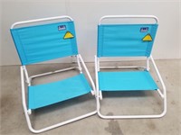 Two blue beach chairs