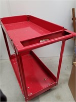 Red metal cart on wheels 31 x 33x 16 in