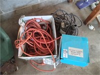 2 sub pumps and a box of extension cords.