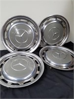 Four hubcaps