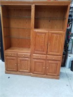 Two large living room cabinets with glass