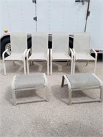 Four outdoor patio chairs with two foot rests