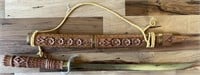 Vintage Sword with Ornate Carved Wooden Sheath